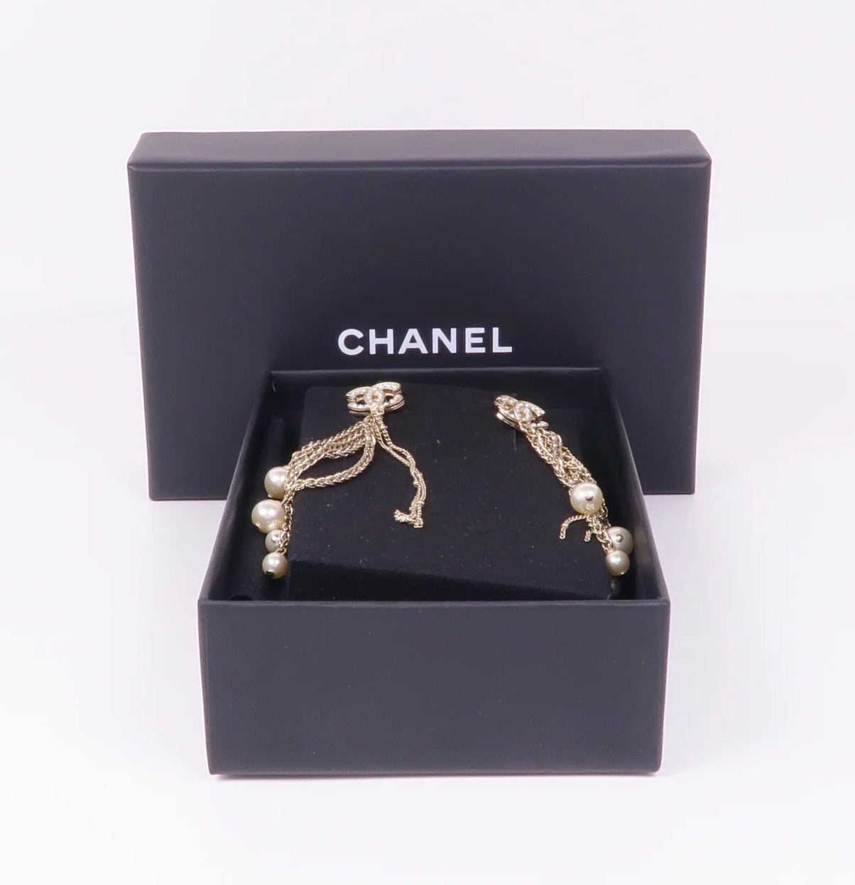 Chanel Gold Tone CC Logo Tassel With Pearls earrings