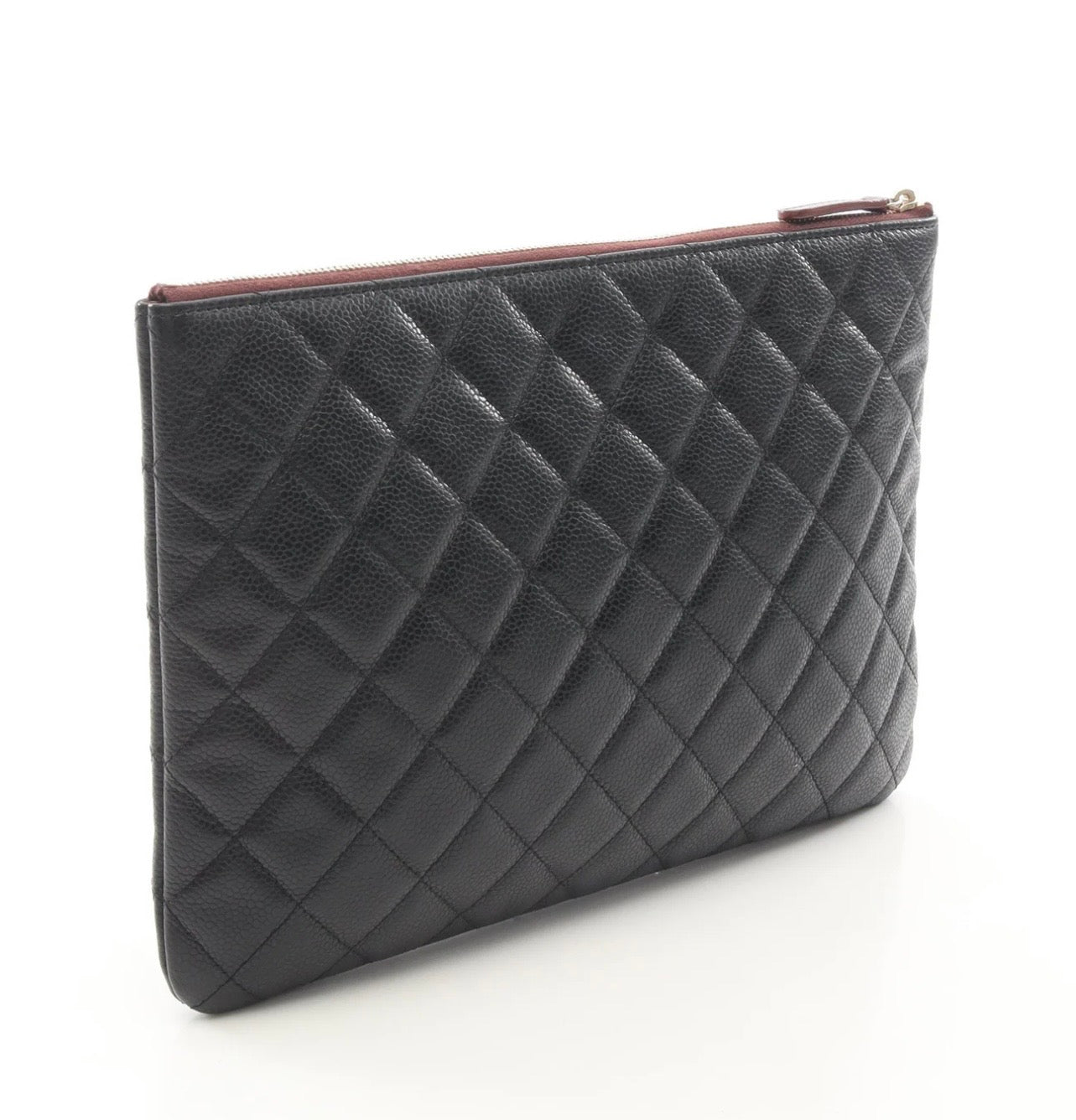 Chanel O Case clutch in black quilted caviar leather
